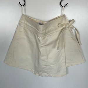 Zara cream skort, denim-like material, strap/string detail for tying | size S